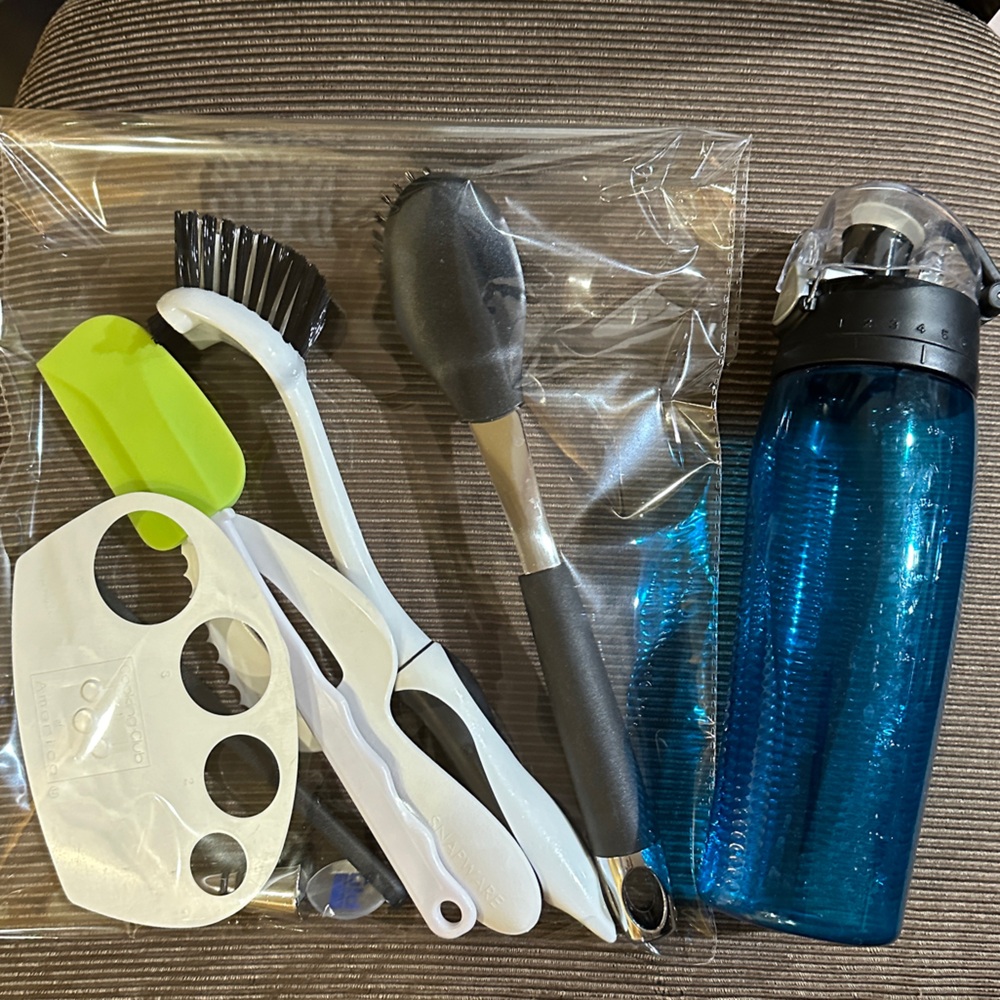 Various Kitchen Utensils + Blue Thermos Bottle